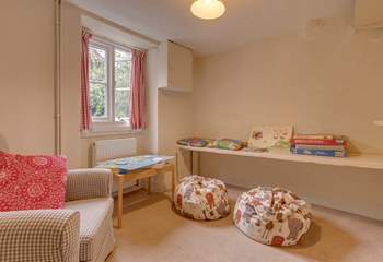There is a snug off the hallway too - an ideal hideaway for children to spread out their toys or play games.