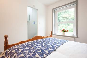 The master bedroom is full of light and beautifully decorated....