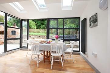The dining-room looks out on to the garden