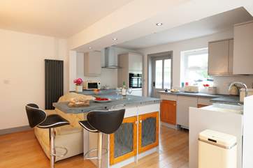The newly fitted kitchen, complete with reclaimed snooker slate kitchen worktop, even with some of the pockets still in situ!