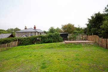 The rear garden with several seating areas