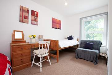 The single bedroom overlooking the garden