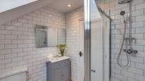 This is the en suite shower-room for the master bedroom. The wonderful shower has a rainfall shower head as well as a conventional one.