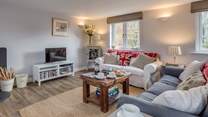Another view of the sitting-room. This is a sunny dual-aspect room but so cosy for a restful stay at any time of the year.