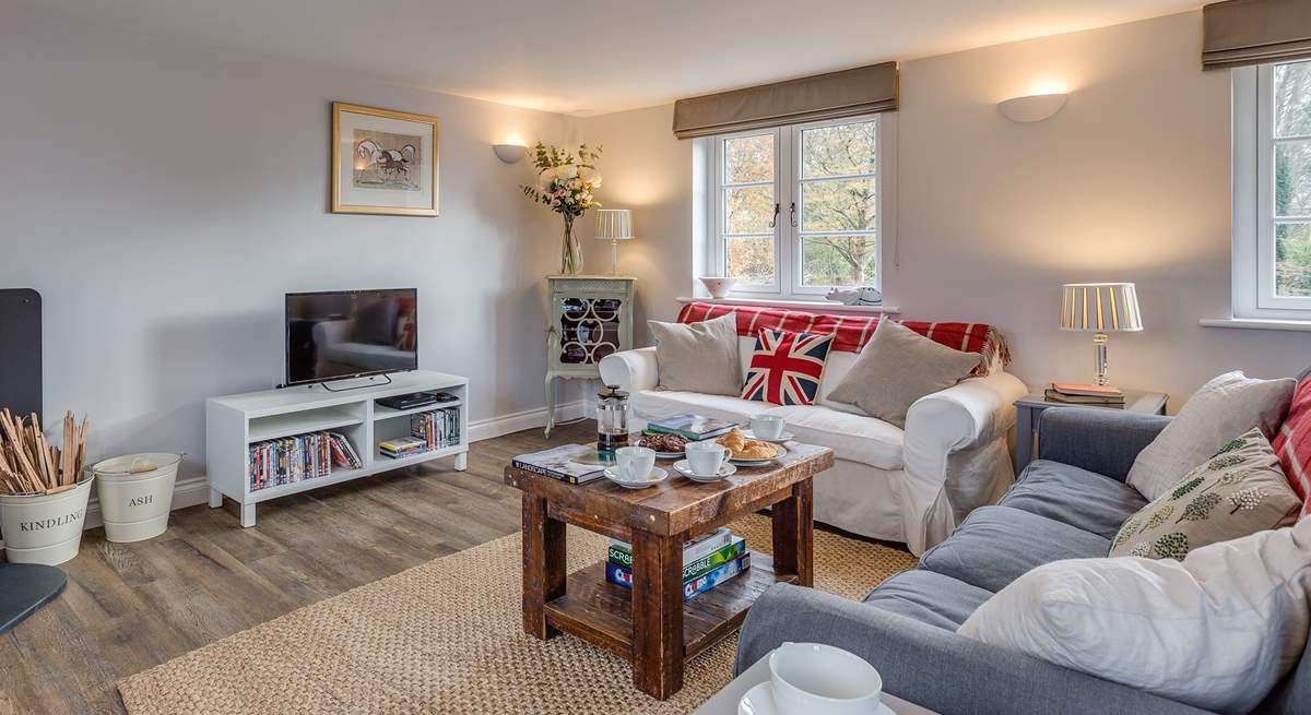 Another view of the sitting-room. This is a sunny dual-aspect room but so cosy for a restful stay at any time of the year.