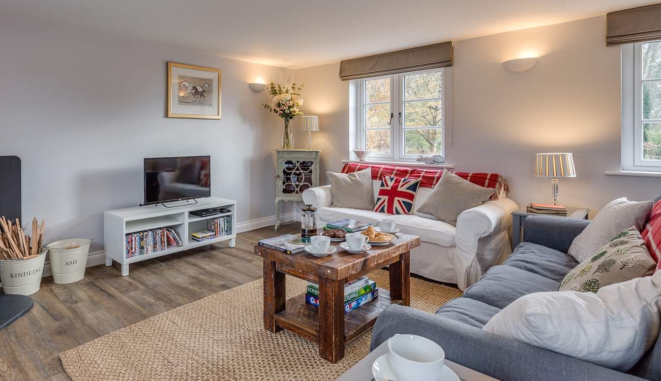Another view of the sitting-room. This is a sunny dual-aspect room but so cosy for a restful stay at any time of the year.
