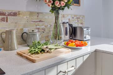 The sparkling worktop will inspire you to cook, but there is also a footpath through woodland directly to the friendly local pub.