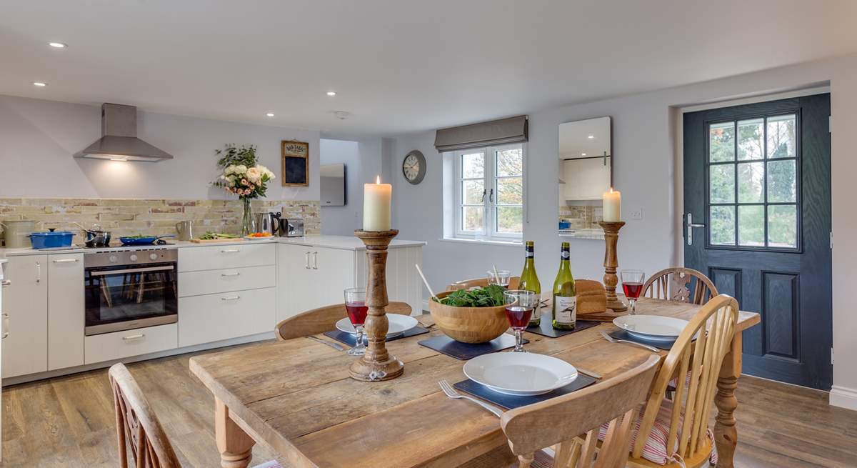 The kitchen/dining-room is really spacious, with the front door opening to the farmstead. 