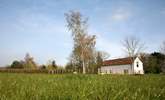 Crab Apple Cottage at Daisyland Farm - with a large enclosed garden and open views over the field to the woodland beyond. - Thumbnail Image