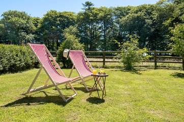 Deck chairs are provided for you to enjoy the garden.