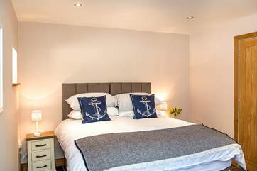 Bedroom 1 adopts a nautical theme - reminding you how close you are to the coast.