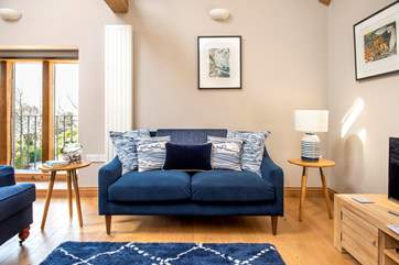 The sea themed cushions are a reminder that this rural idyll is not far from the stunning north coast.