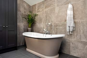 Treat yourself to a leisurely soak in the gorgeous free-standing bath.