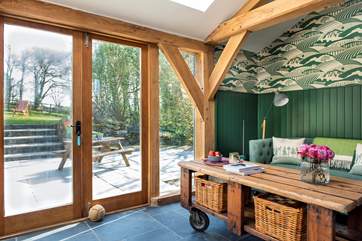 Double doors really let the light flood in and head directly out to the sunny terrace and garden.