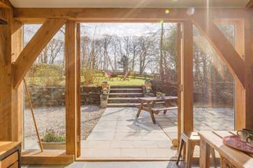 Double doors lead you out to the sunny terrace and garden