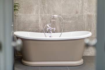 Treat yourself to a leisurely soak in the gorgeous free-standing bath.