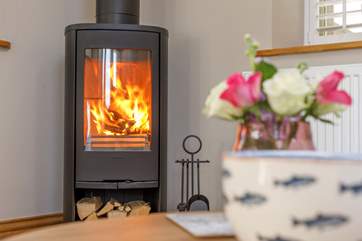 On chiller days, snuggle up in front of the toasty woodburner
