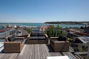 Relax and enjoy the stunning view across the Solent from the roof top terrace