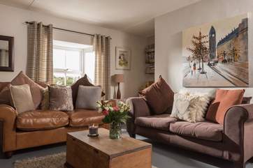 The second sitting-room has two more sofas!
