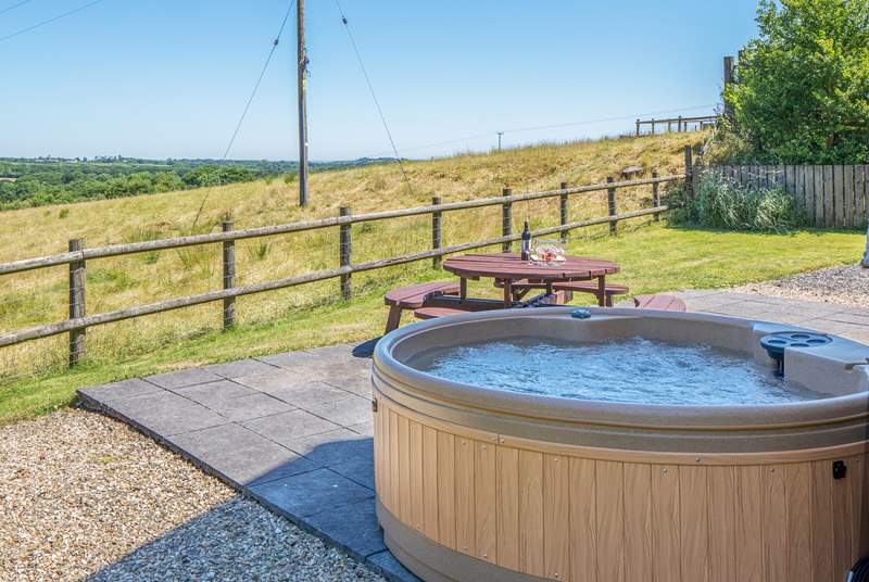 What incredible views to enjoy from your private hot tub in the fully enclosed patio and garden area.