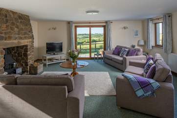 The sitting-room boasts a glorious wood-burner. Perfect for those cosy nights in.