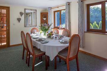 The dining-room offers another spot to gather as a family and enjoy a feast.