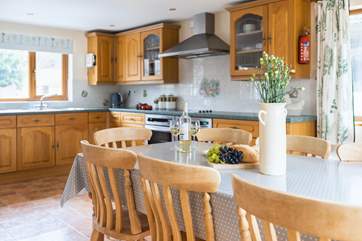 The kitchen diner is a spacious room with a well equipped kitchen, with patio doors out on to the side garden.