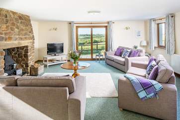 The sitting-room boasts a glorious wood-burner. Perfect for those cosy nights in.