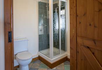 Downstairs you have a WC and shower cubicle. Perfect for washing the day away the moment you step into the cottage.