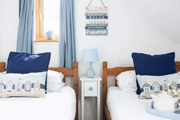 Bedroom 3 also offers a beautifully styled twin bedroom.