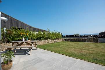 The enclosed garden has lovely views across countryside to Mount's Bay.