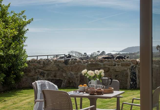 The enclosed garden has lovely views across countryside to Mount's Bay.