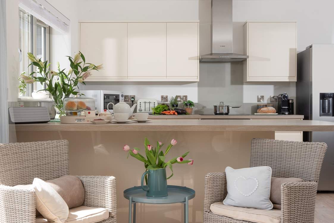 The well-equipped open plan kitchen and living area.