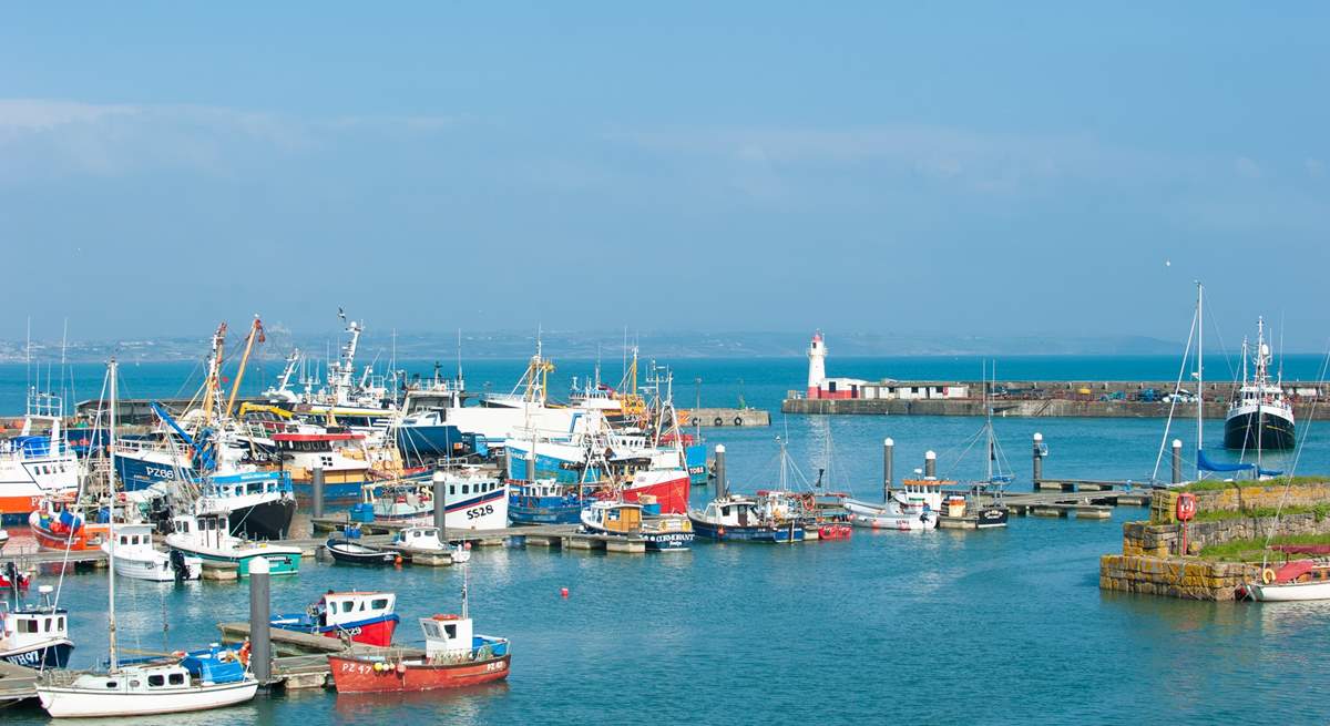 Visit the bustling fishing harbour at Newlyn, buy the freshest of fish and head back to Parlour Sky for a Cornish feast.