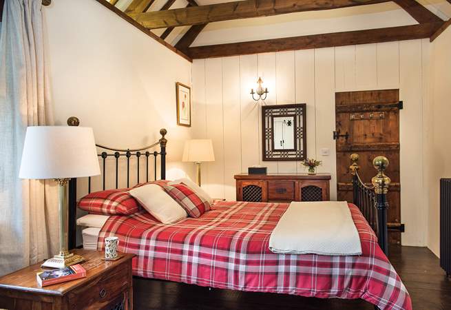 The open beams and vaulted ceiling add to the overall charm of Meadow Barn.