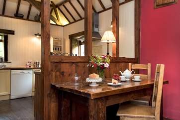 The dining-area is located next to the kitchen.