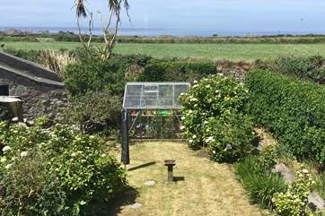 The view from the bedroom looking across the fields and Cape Cornwall Golf Course to the sea.