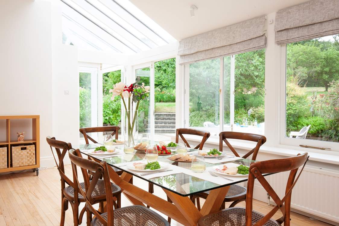 There is a lovely large dining-table to gather around and enjoy mealtimes.
