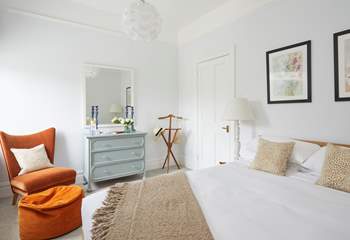 The sophisticated double bedroom has a calming feel.