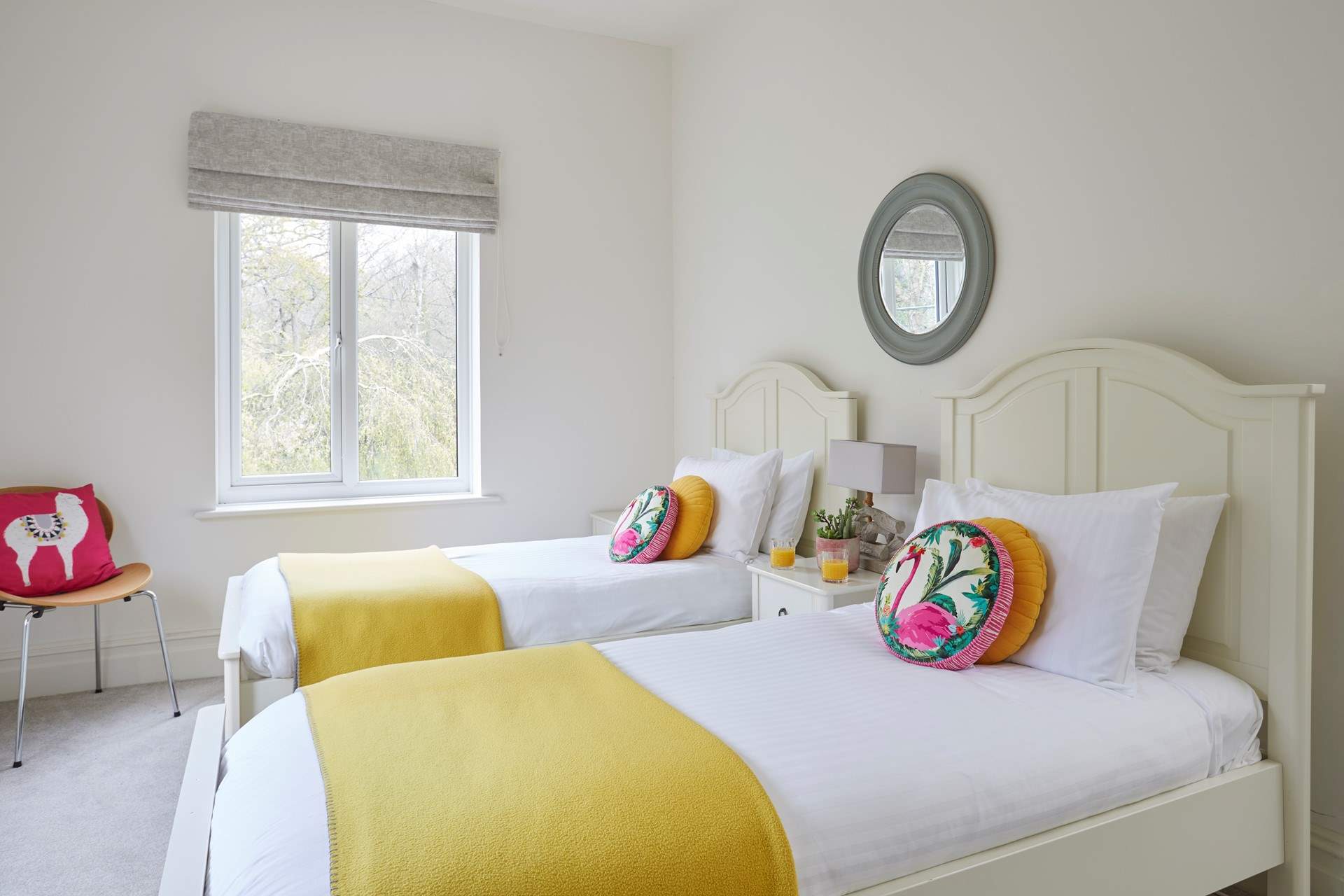 The pretty twin bedroom is suitable for both children and adults.