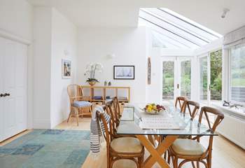 The light filled dining area is a great spot to gather and plan your days ahead.