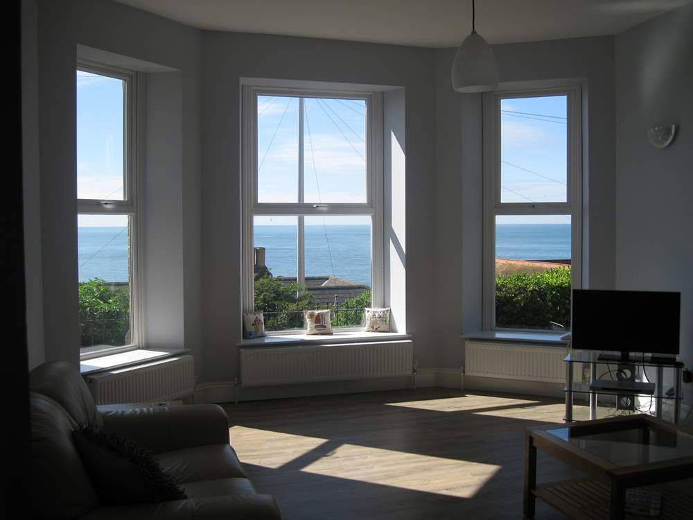 The wonderful views from the sitting-room will take your breath away.