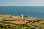 St Catherine's Lighthouse located at St Catherine's Point the southern tip of the Isle of Wight is one of the oldest remaining lighthouses in Great Britain.  Enjoy a breath-taking walk and stop in at the cliff top 16th century Buddle Inn for a meal.