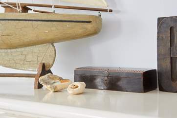 Lovely attention to detail can be found on the mantlepiece.