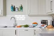 All the necessary kitchen items can be found to prepare a meal.