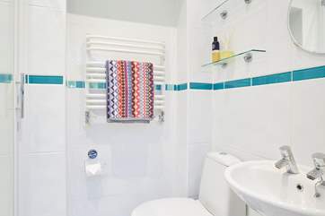 The ensuite shower room to the main bedroom.