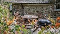 Your private and secluded patio-area is the perfect spot to relax with a good book.