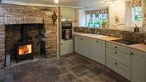 Even the kitchen has a top of the range wood-burning stove.