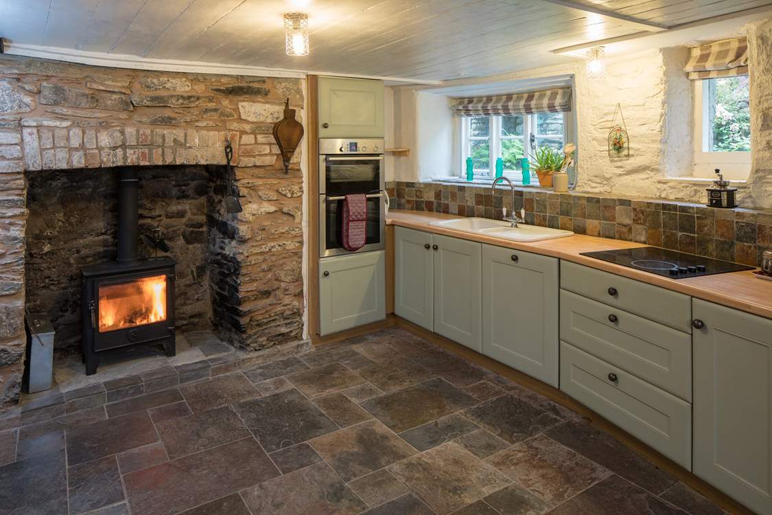 Even the kitchen has a top of the range wood-burning stove.