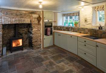 Even the kitchen has a top of the range wood-burning stove.